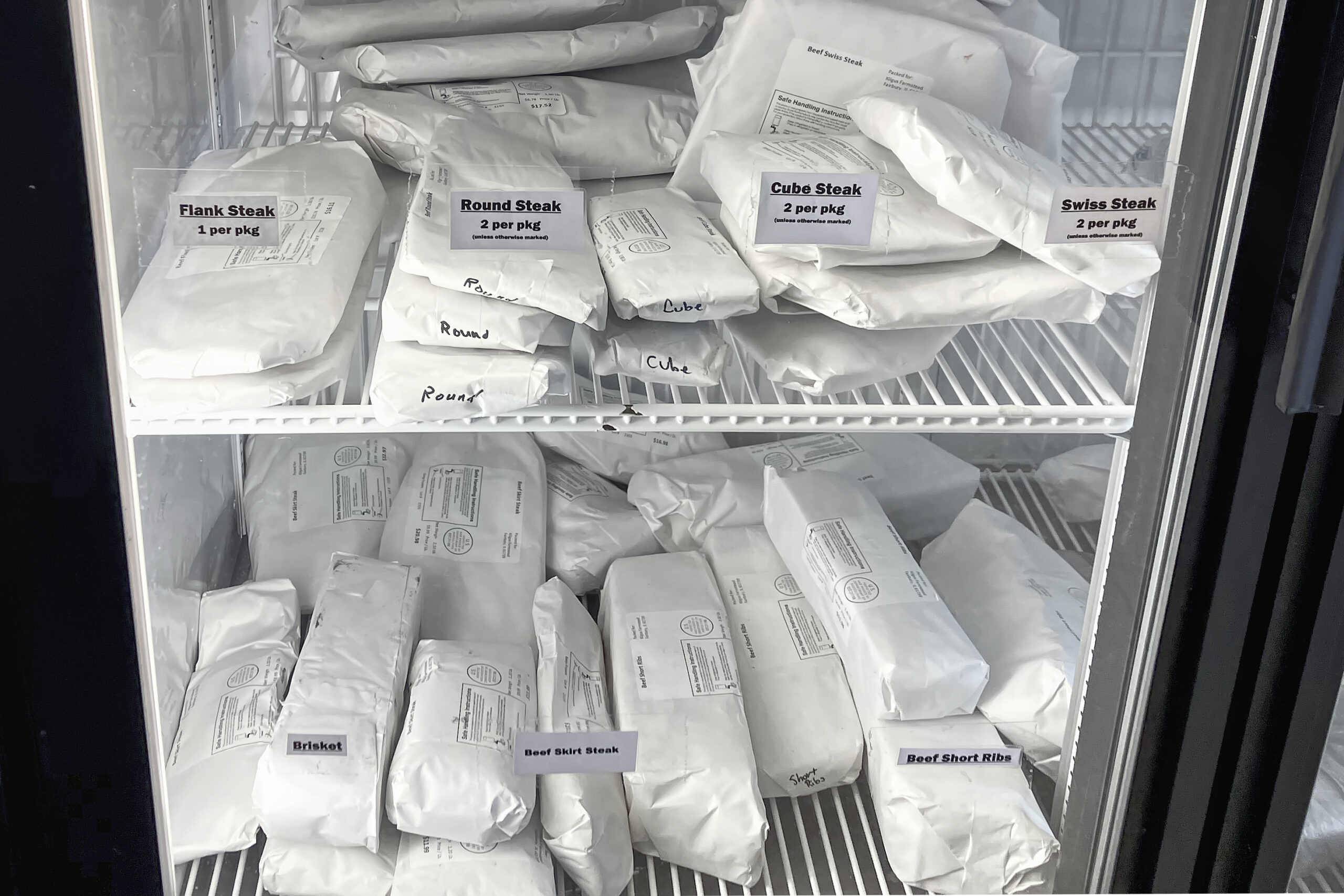 butcher wrapped meat products in freezer